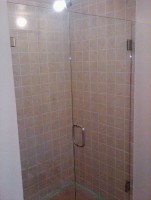 Frameless door and panel with clamps Frameless door and panel with clamps